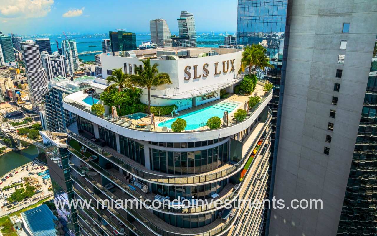 SLS Lux drone overlooking condo building angle with rooftop pool