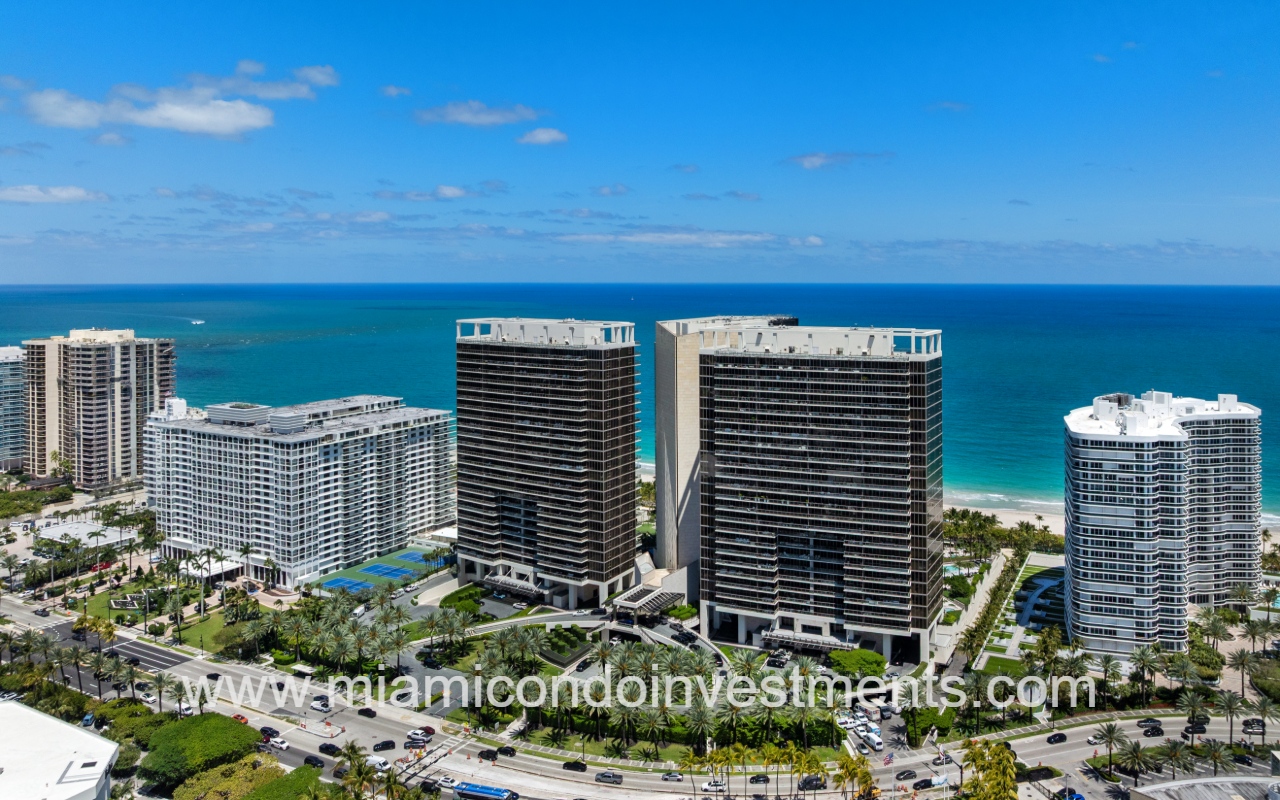 St. Regis Bal Harbour North drone view of condo building with blue ocean backdrop