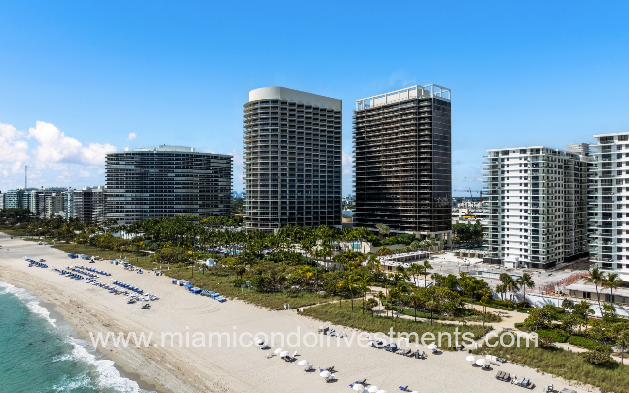 St. Regis Bal Harbour North drone angle view of condo building from above the beach shoreline