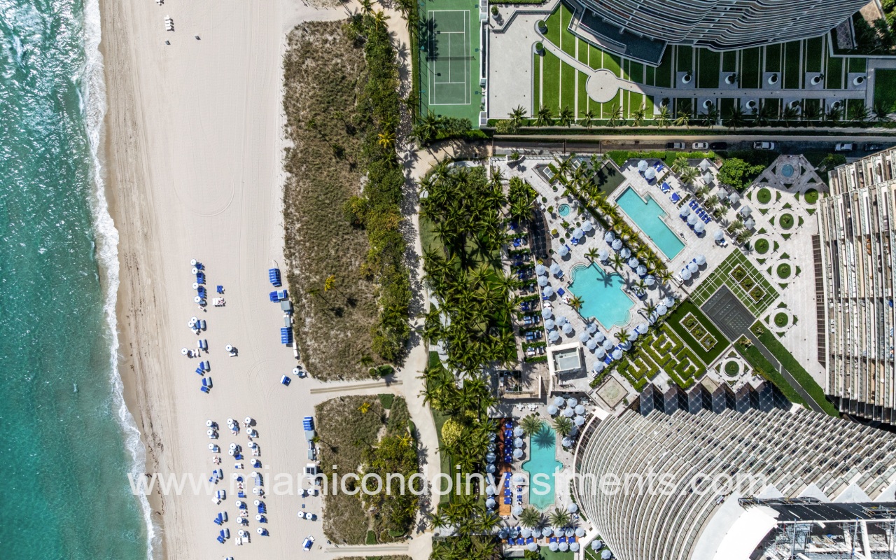 St. Regis Bal Harbour South drone top down view of pool and beach area