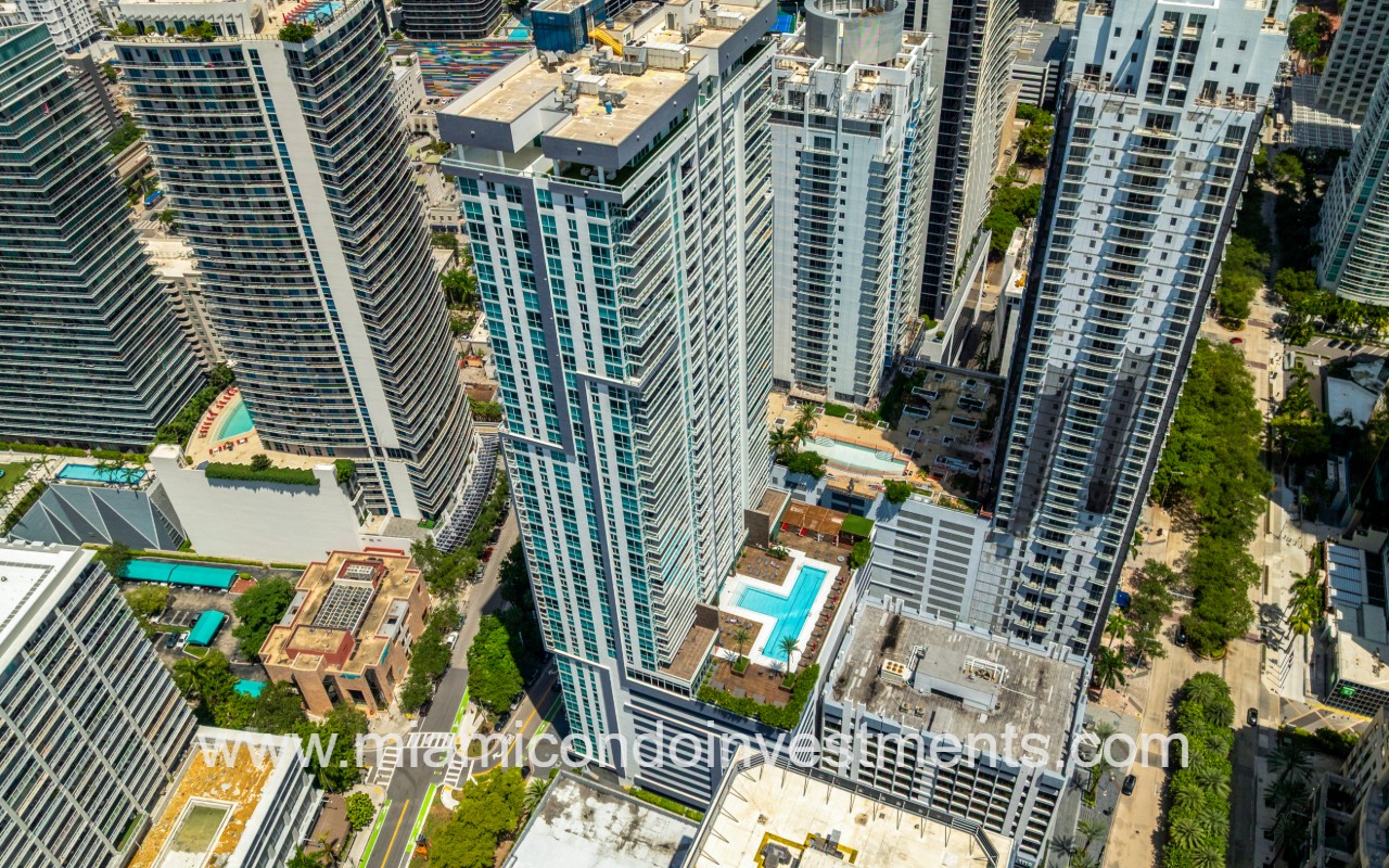 The Bond on Brickell angle drone view facing condo building and pool