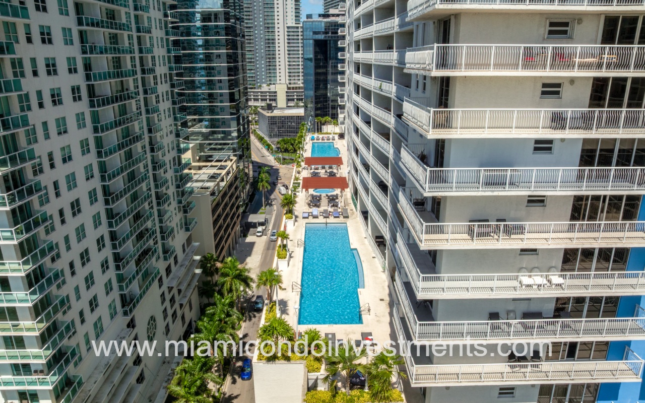 The Club at Brickell Bay drone view of condo building profile exterior and pool