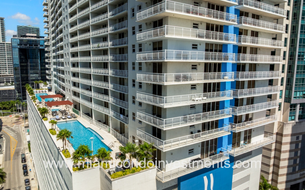 The Club at Brickell Bay drone view closeup angle of condo building profile exterior and pool