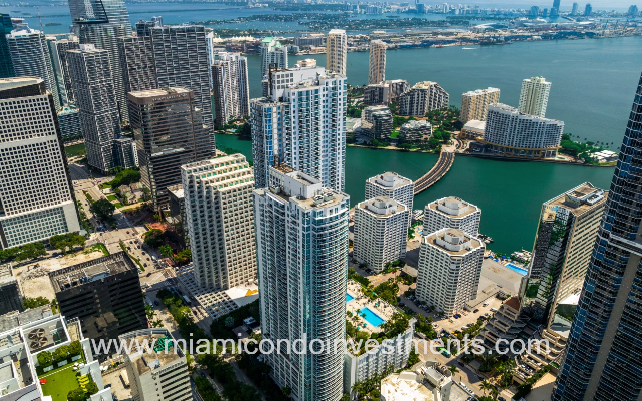 The Plaza on Brickell West drone aerial view overlooking condo building and bay