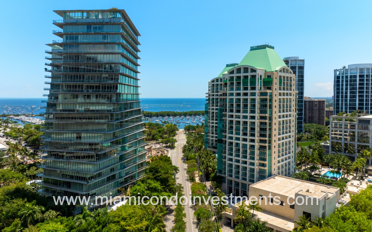 The Ritz-Carlton Residences front angle view facing building and street with ocean backdrop