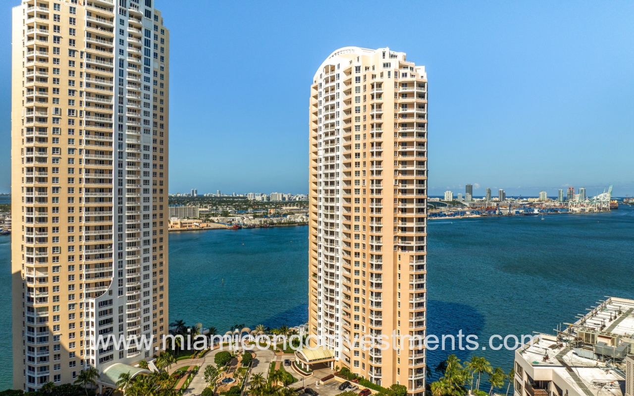 Two Tequesta Point drone facing condo building with waterfront views surrounding