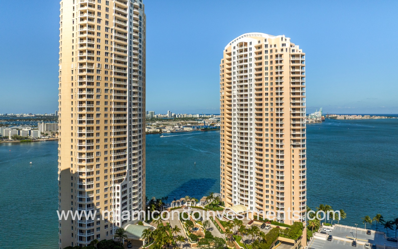 Two Tequesta Point drone facing condo building with waterfront backdrop