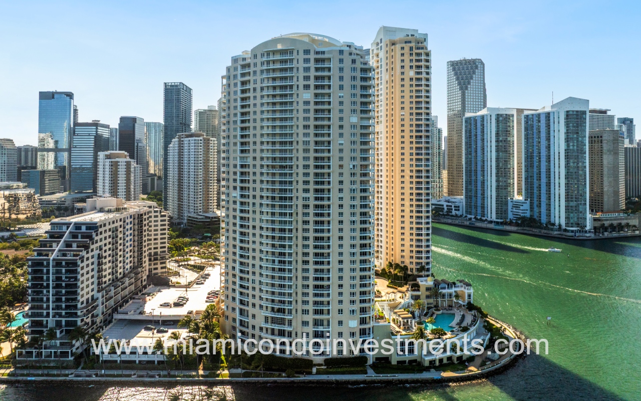 Two Tequesta Point drone directly facing condo building from above waterfront