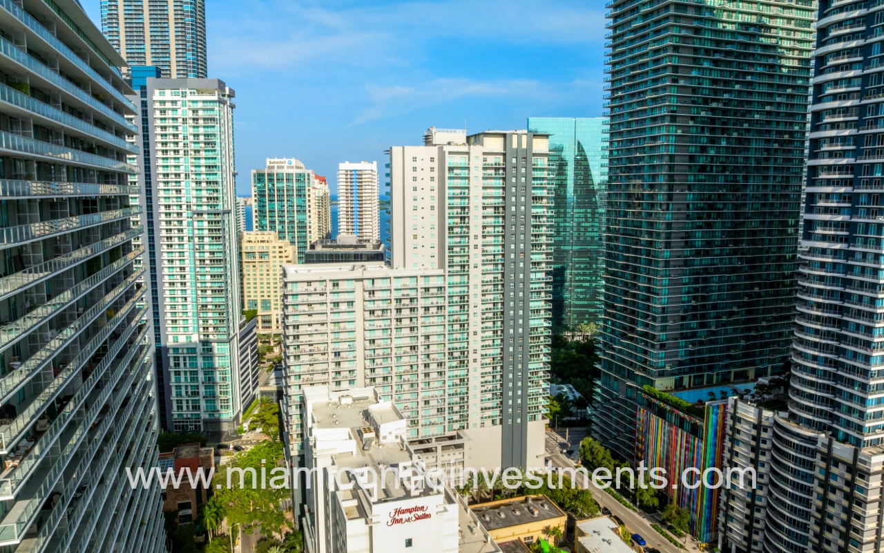 Vue drone facing condo building side exterior