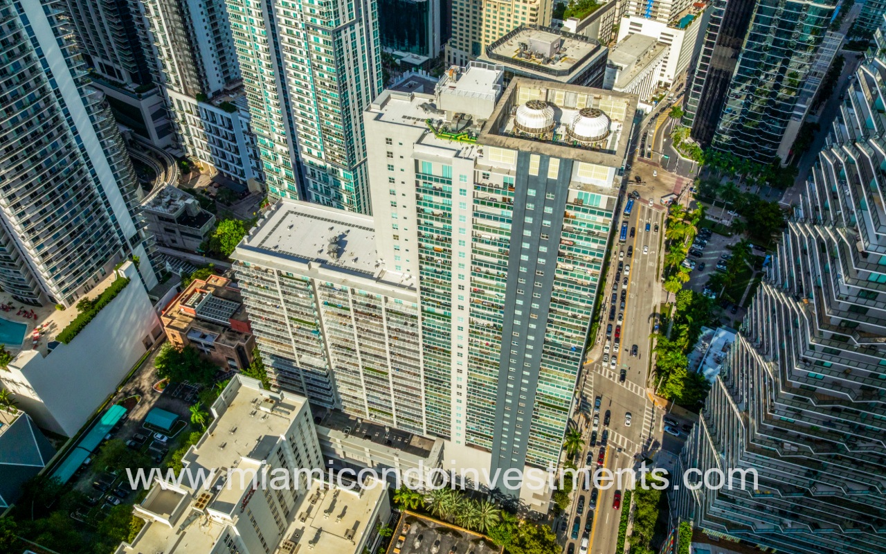 Vue drone aerial view looking down at condo building