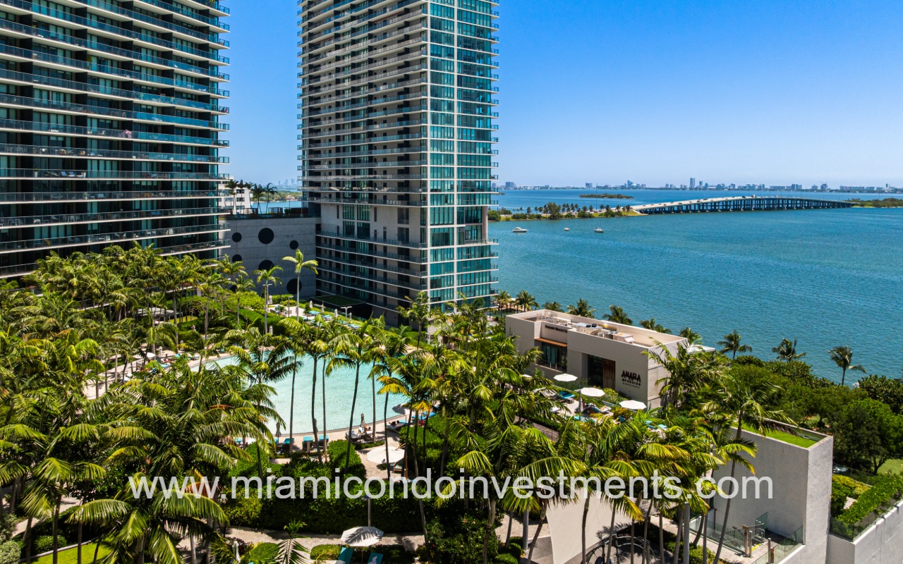 Gran Paraiso drone view of condo building angle overlooking pool and waterway