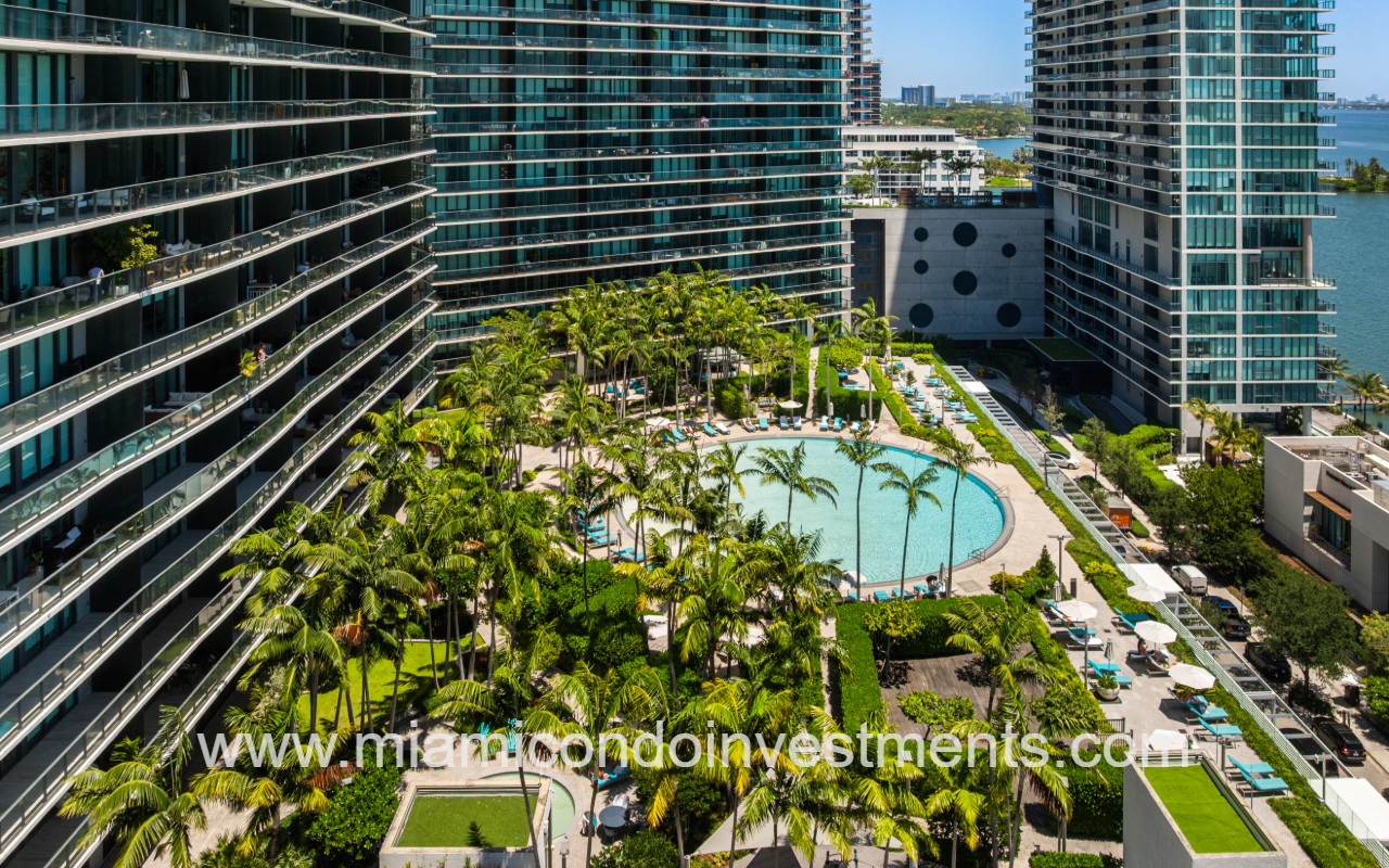 Gran Paraiso drone of lower condo building exterior and pool
