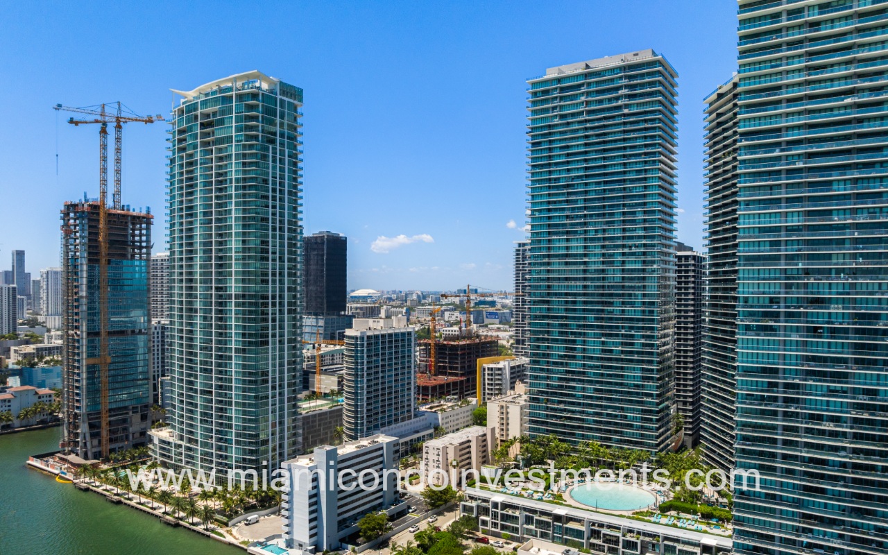 Gran Paraiso drone view of condo building from over waterway