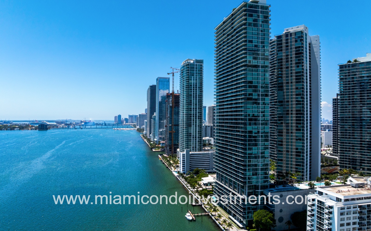 One Paraiso drone long view of condo buildings directly on the bay
