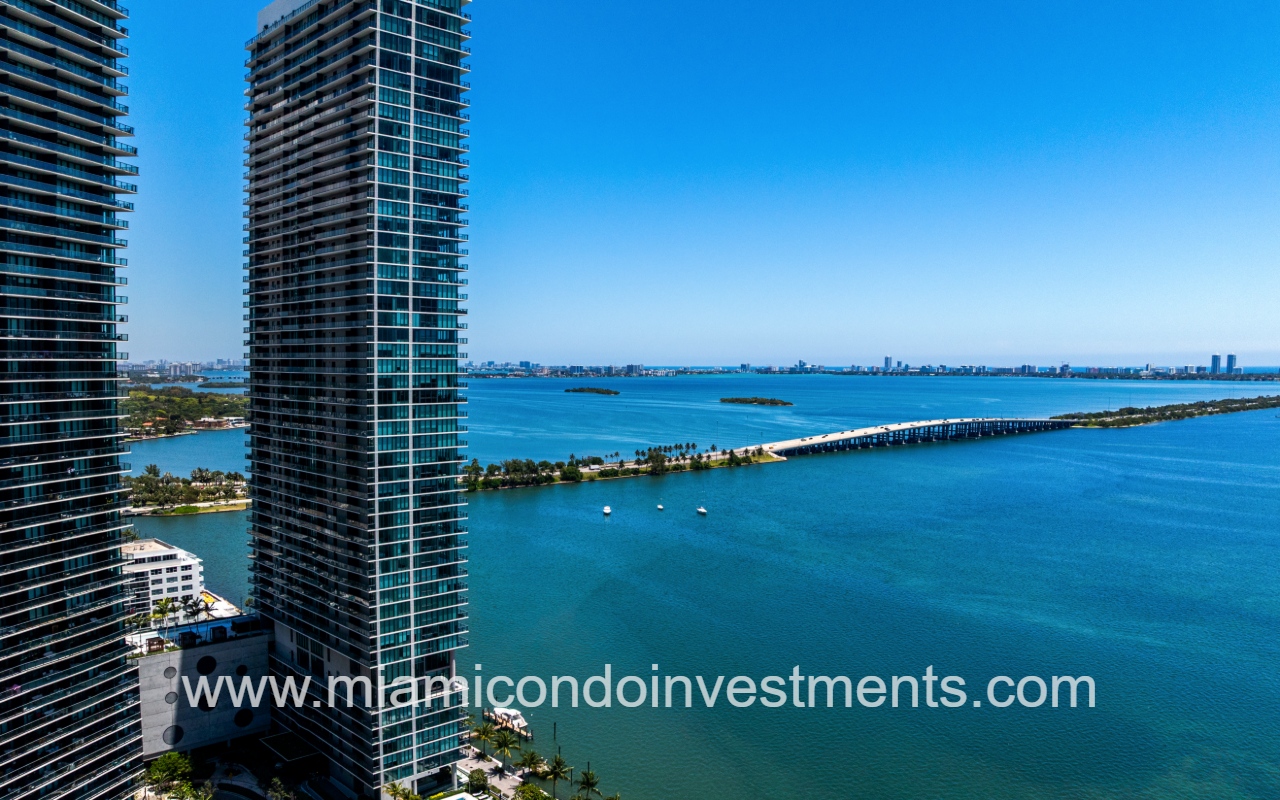 One Paraiso drone view off the side of condo building overlooking the bay