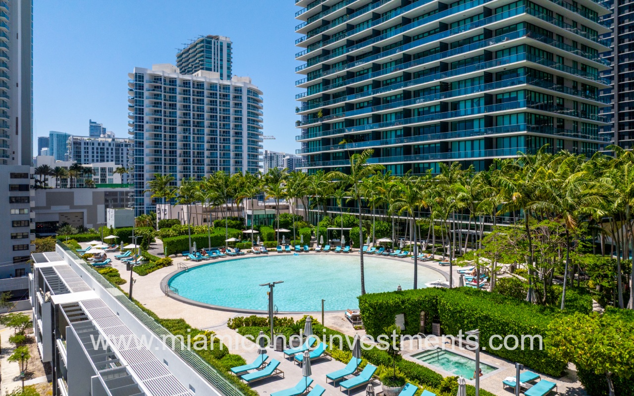 Paraiso Bay drone view of condo building pool