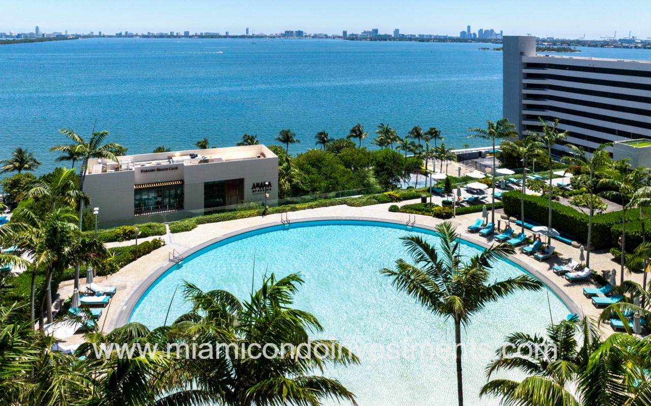 Paraiso Bay drone view overlooking condo building pool