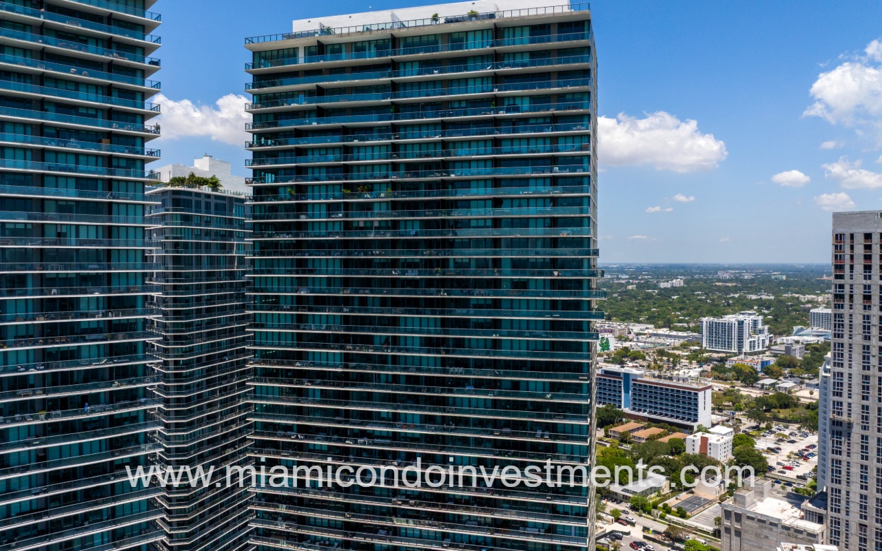 Paraiso Bay drone view of top half of condo building exterior
