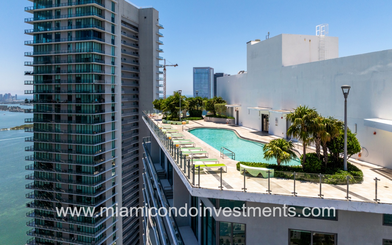 Paraiso Bayviews drone view of condo building rooftop pool