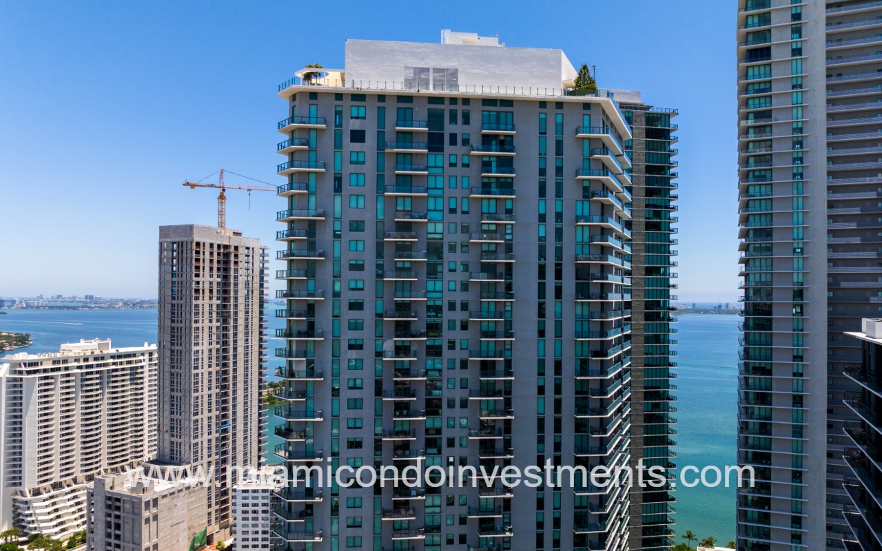 Paraiso Bayviews drone view of top half exterior of condo building