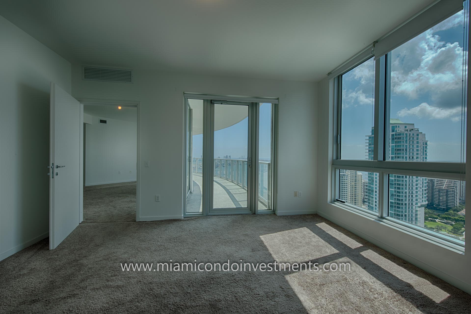 master bedroom with views of the Miami River, Brickell Key, Brickell, and Biscayne Bay master bedroom with views of the Miami River, Brickell Key, Brickell, and Biscayne Bay