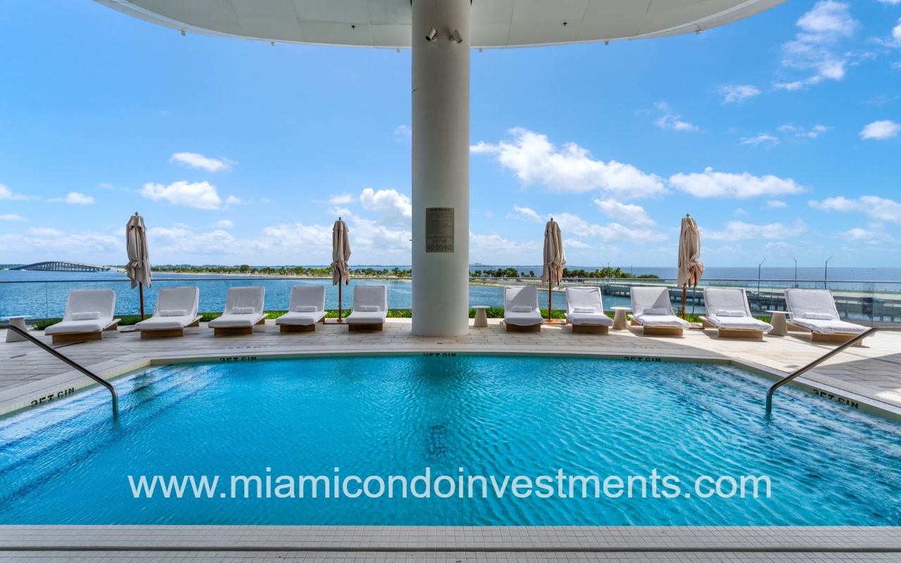 UNA Residences condo building pool deck overlooking Biscayne Bay