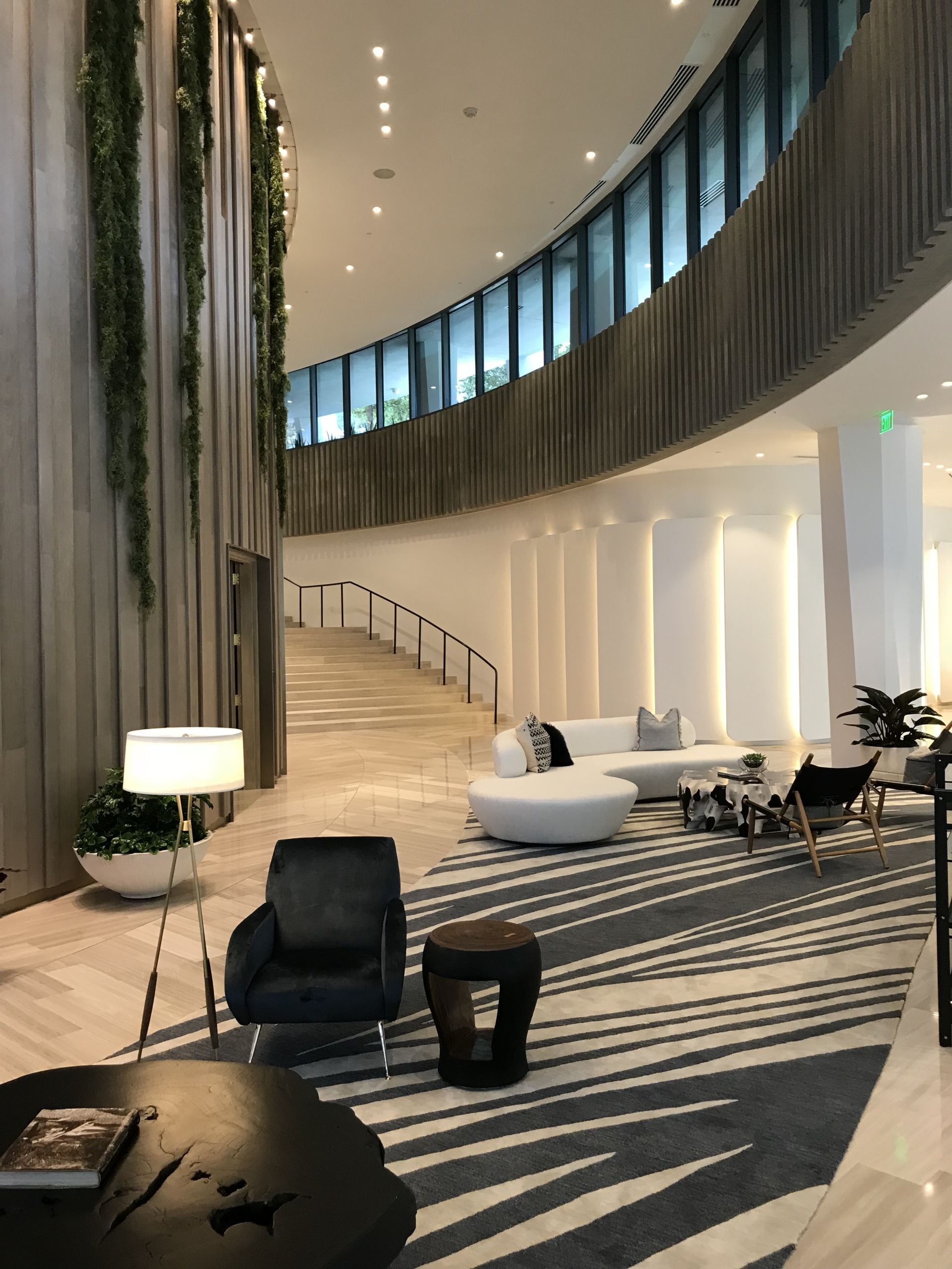 lobby living room and staircase at Park Grove Club Residences