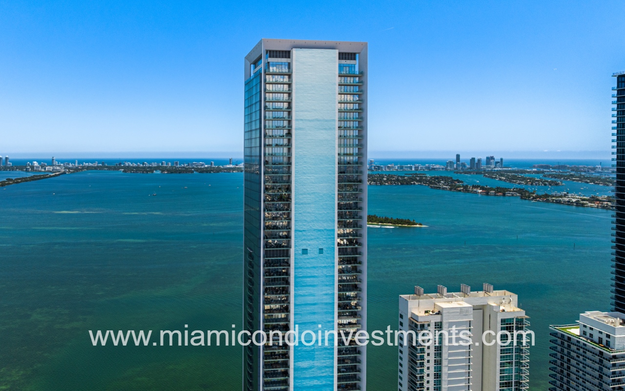 Missoni Baia drone top half of building exterior with bay view backdrop