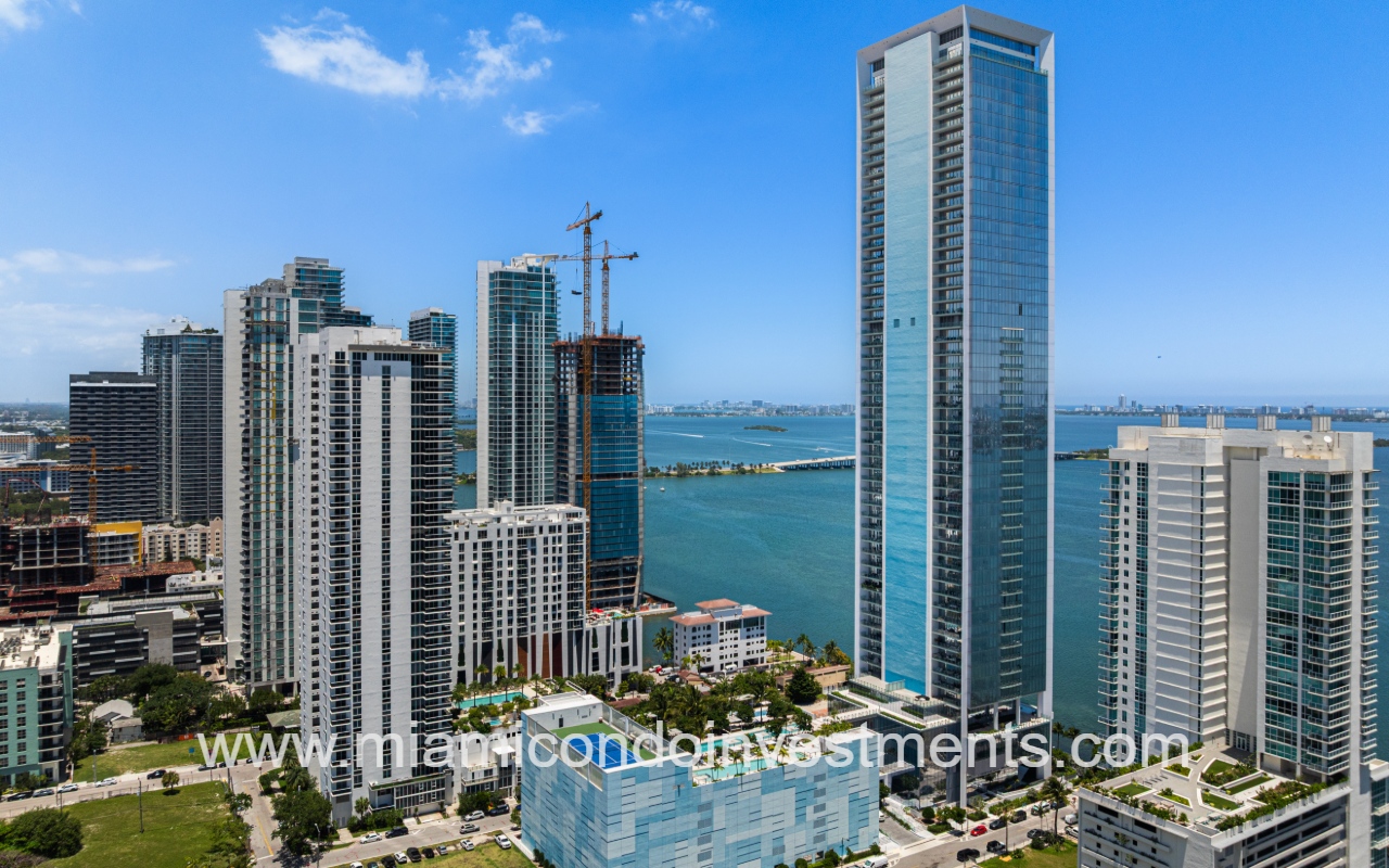 Missoni Baia drone facing angle view of building with bay view backdrop