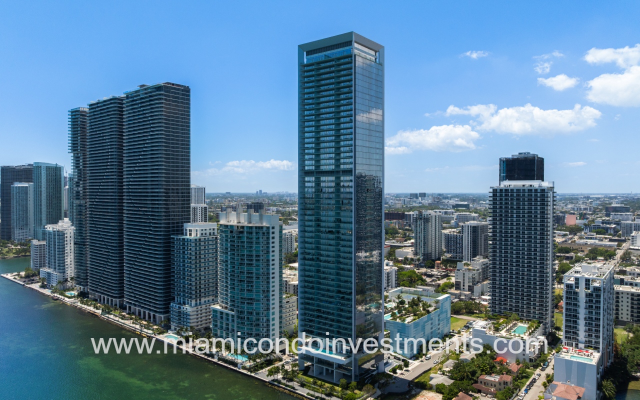 Missoni Baia drone view overlooking condo building from above waterway