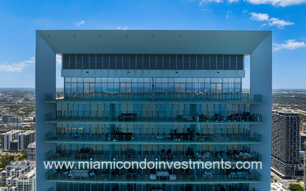 Missoni Baia drone view directly facing top part of condo building exterior