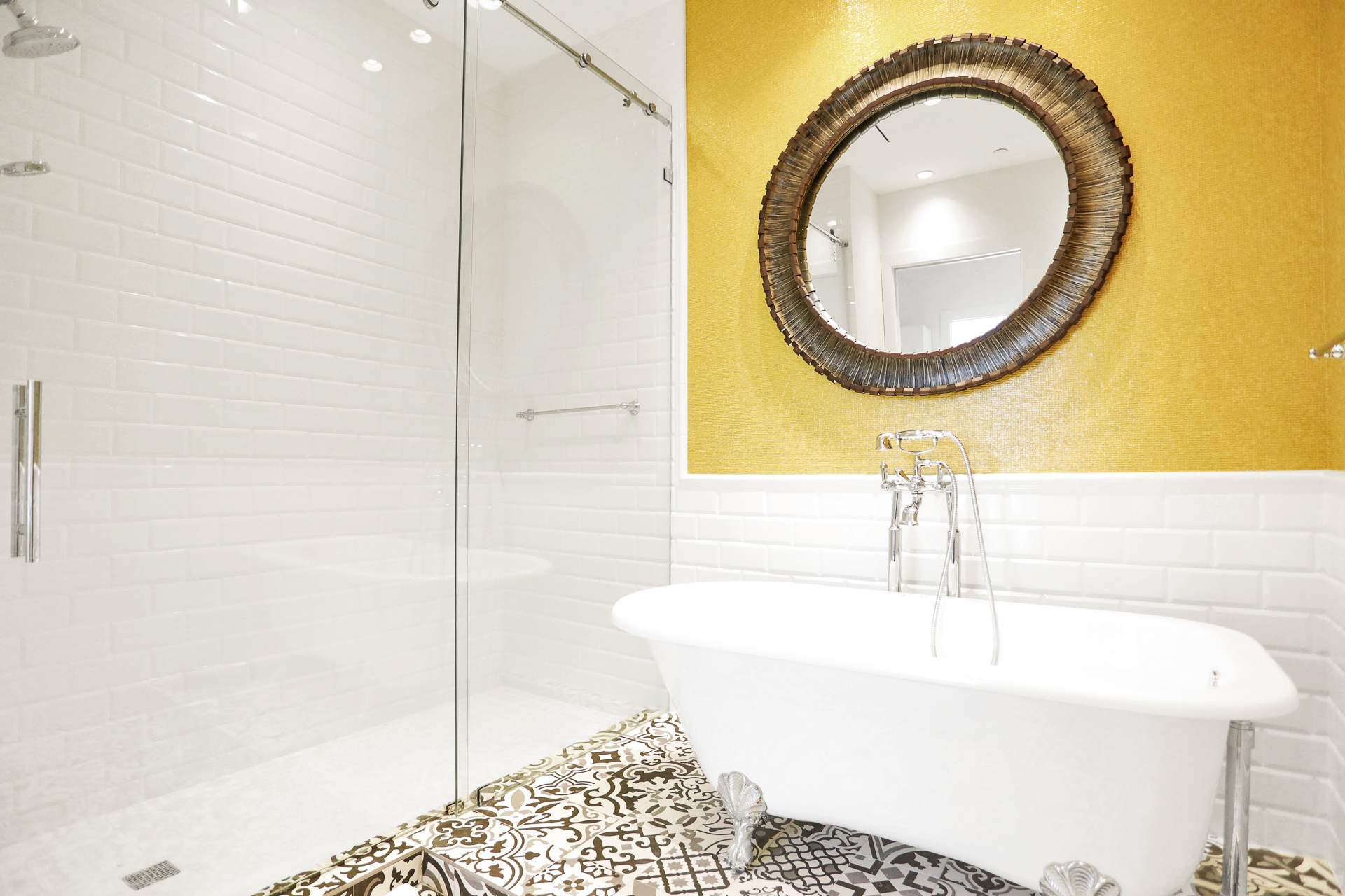 remodeled master bathroom with pedestal tub