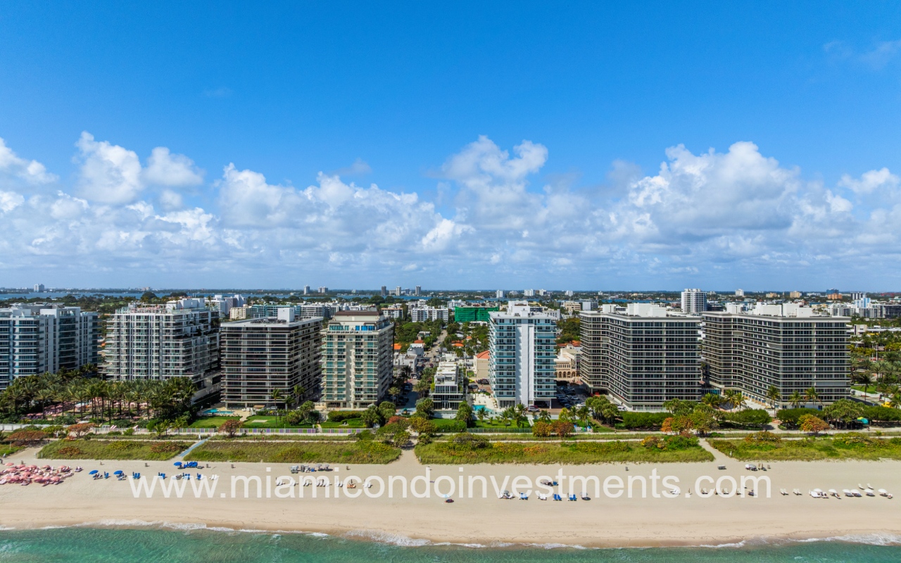 Ocean Seven drone view directly facing condo building and buildings along beach shoreline