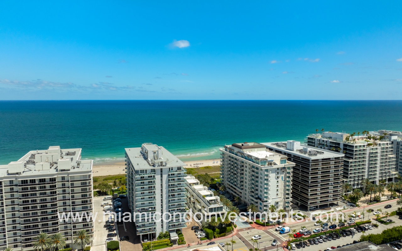Ocean Seven drone view overlooking condo building on blue oceanfront