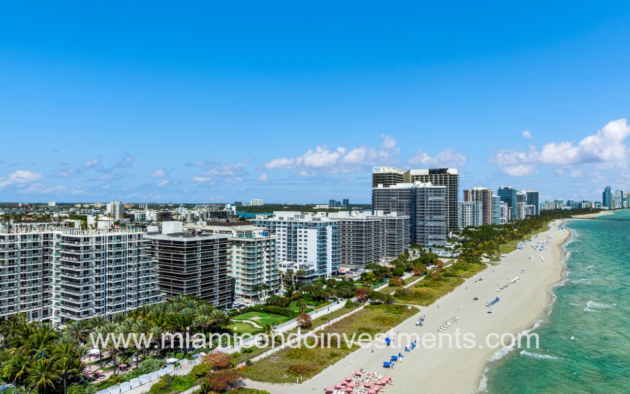 The Waves drone profile view overlooking condo building on the beach shoreline