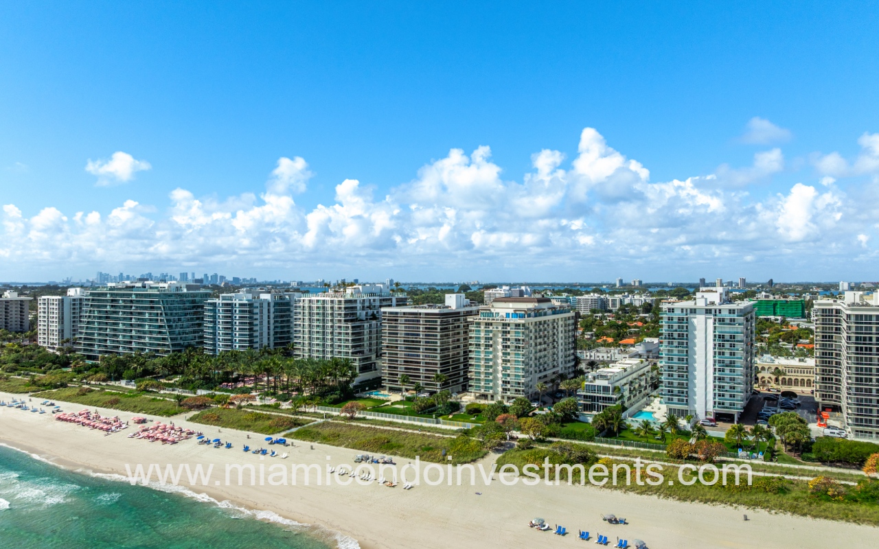 The Waves drone angle view directly facing the condo building and beach from above the ocean