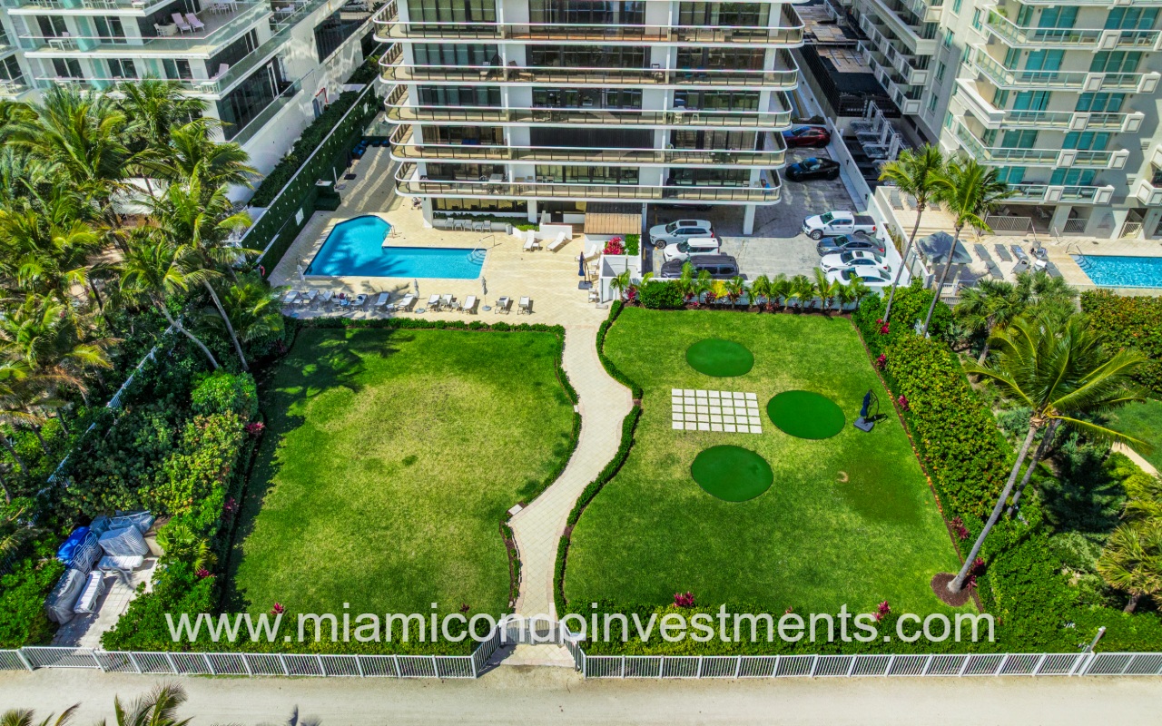 The Waves drone view overlooking lower condo exterior and pool area