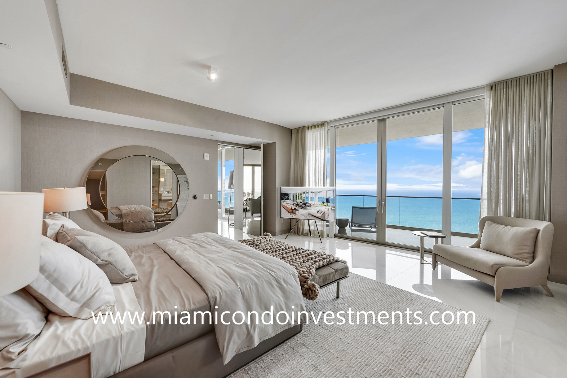 master bedroom at Armani Casa Residences with direct views of the Atlantic Ocean master bedroom designed by Artefacto