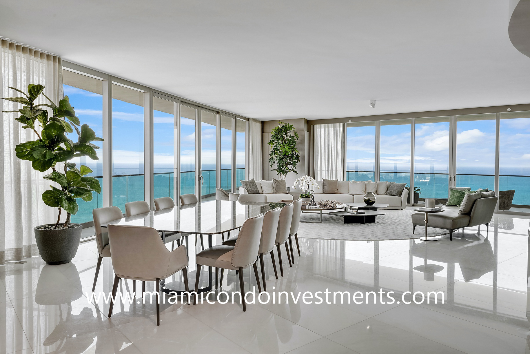 dining and living room areas with direct ocean views