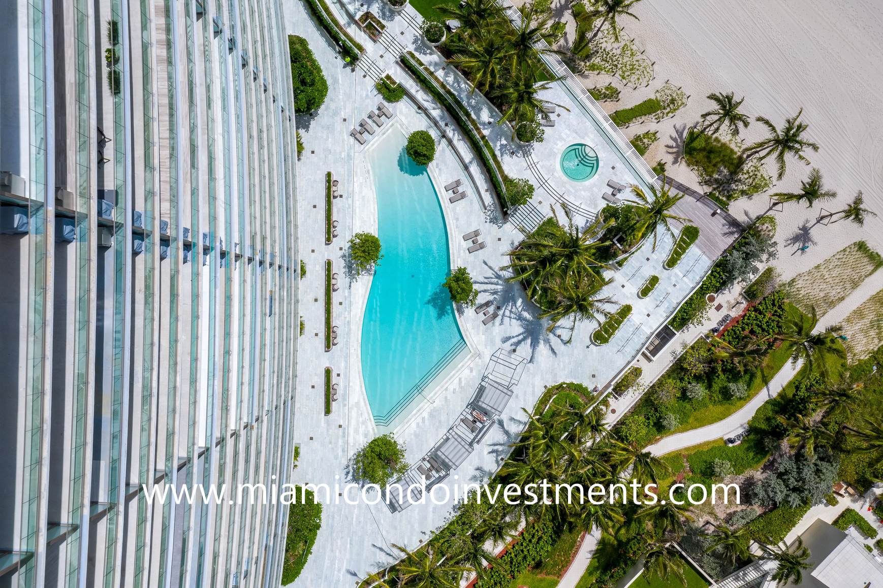 aerial view of the pool deck at Armani Casa Residences drone photo of the pool deck at Residences by Armani Casa Residences