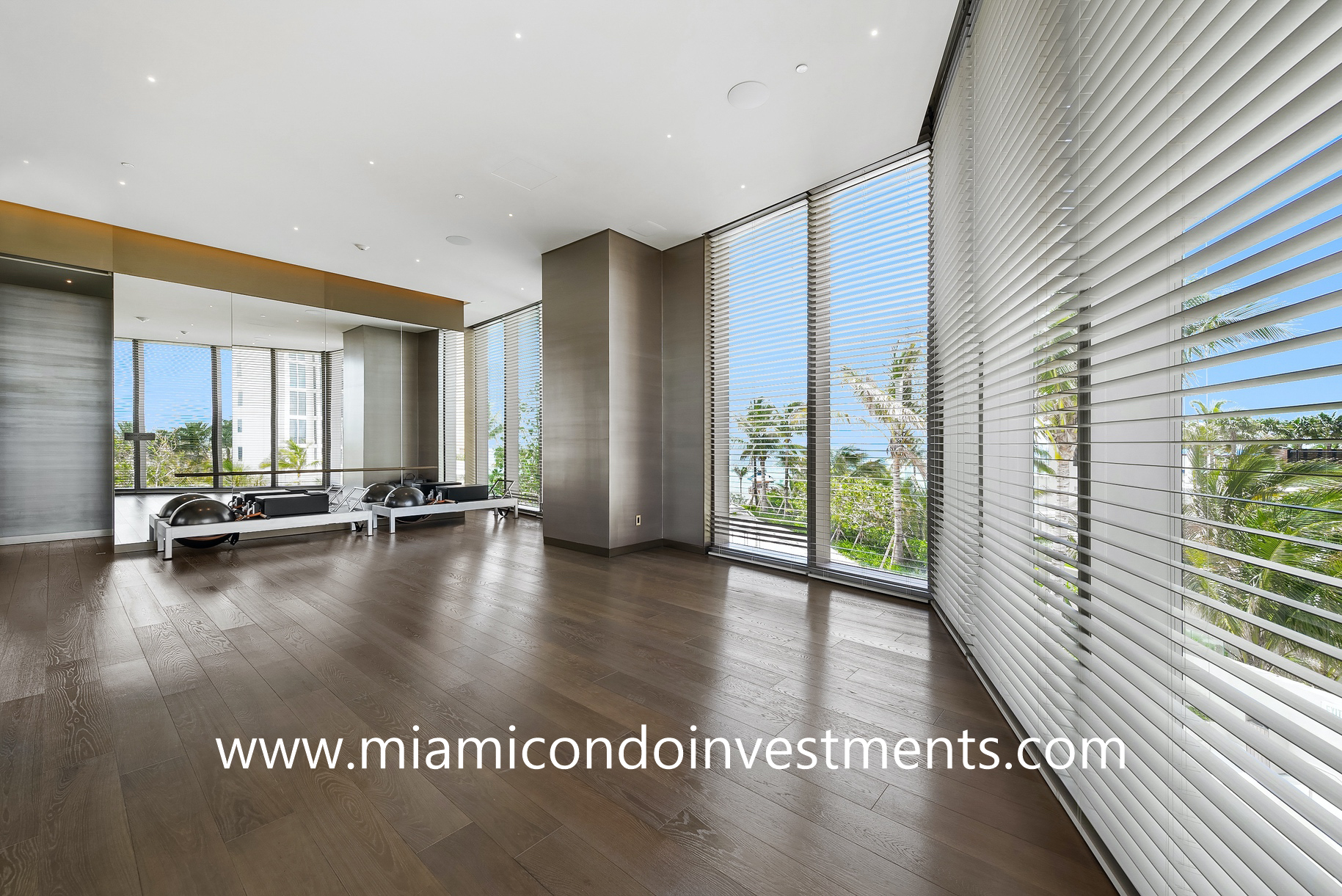 yoga room with pilates equipment at Armani Casa Residences