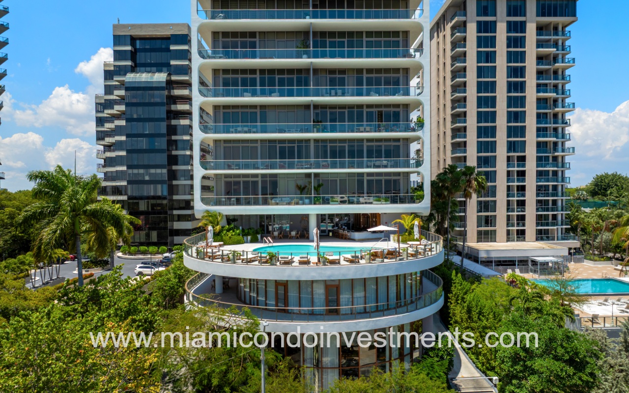 Mr. C Residences drone facing lower part of building with pool