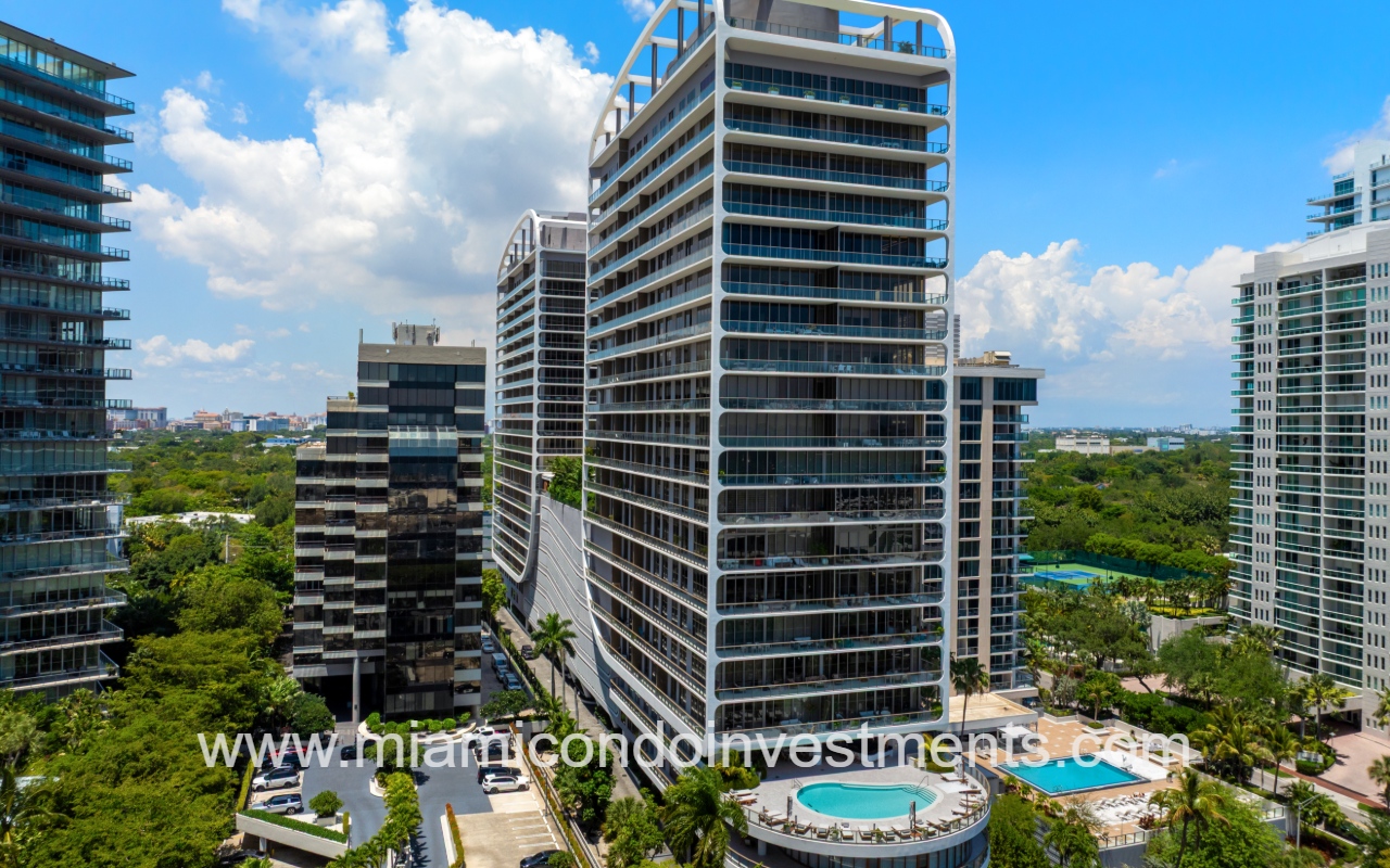 Mr. C Residences drone facing building with pool slight angle closeup
