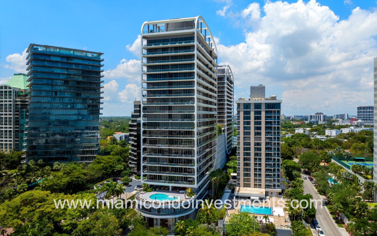 Mr. C Residences drone facing building with pool slight angle