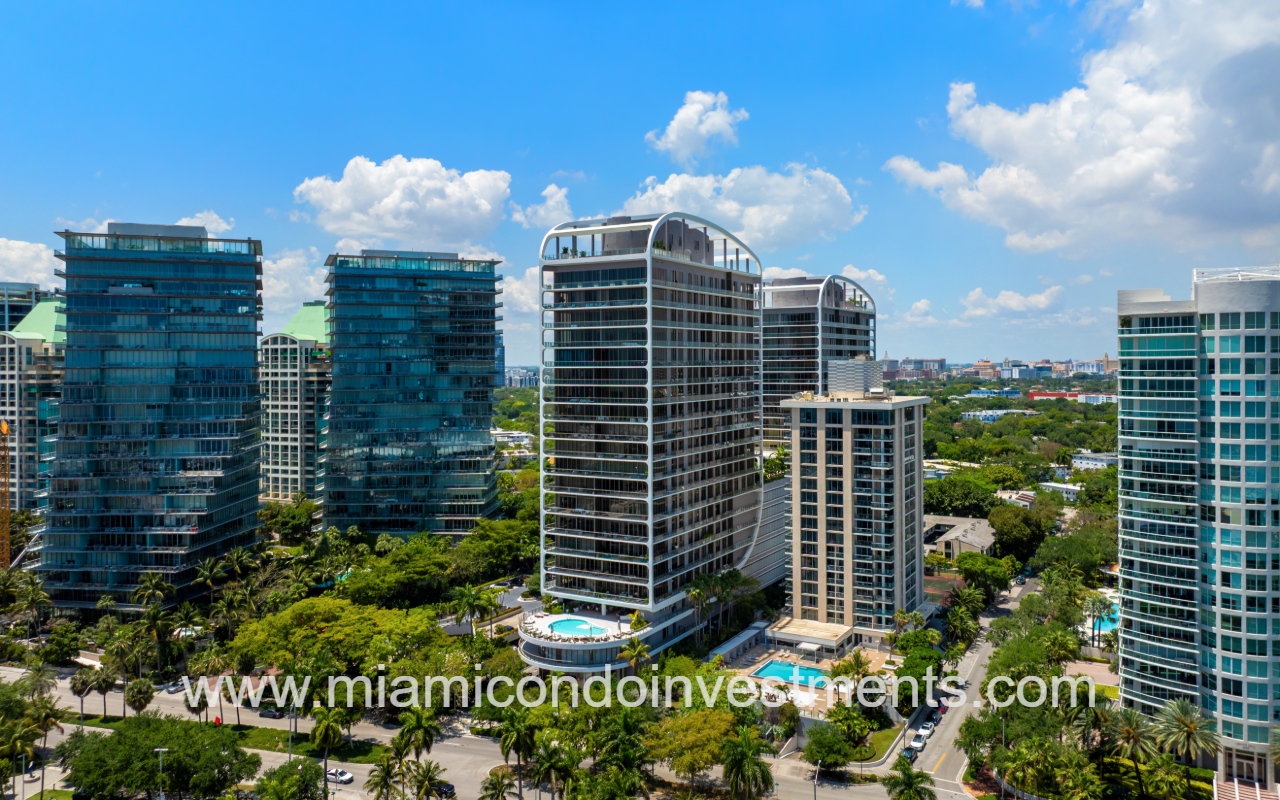 Mr. C Residences drone facing building with pool and surrounding area view