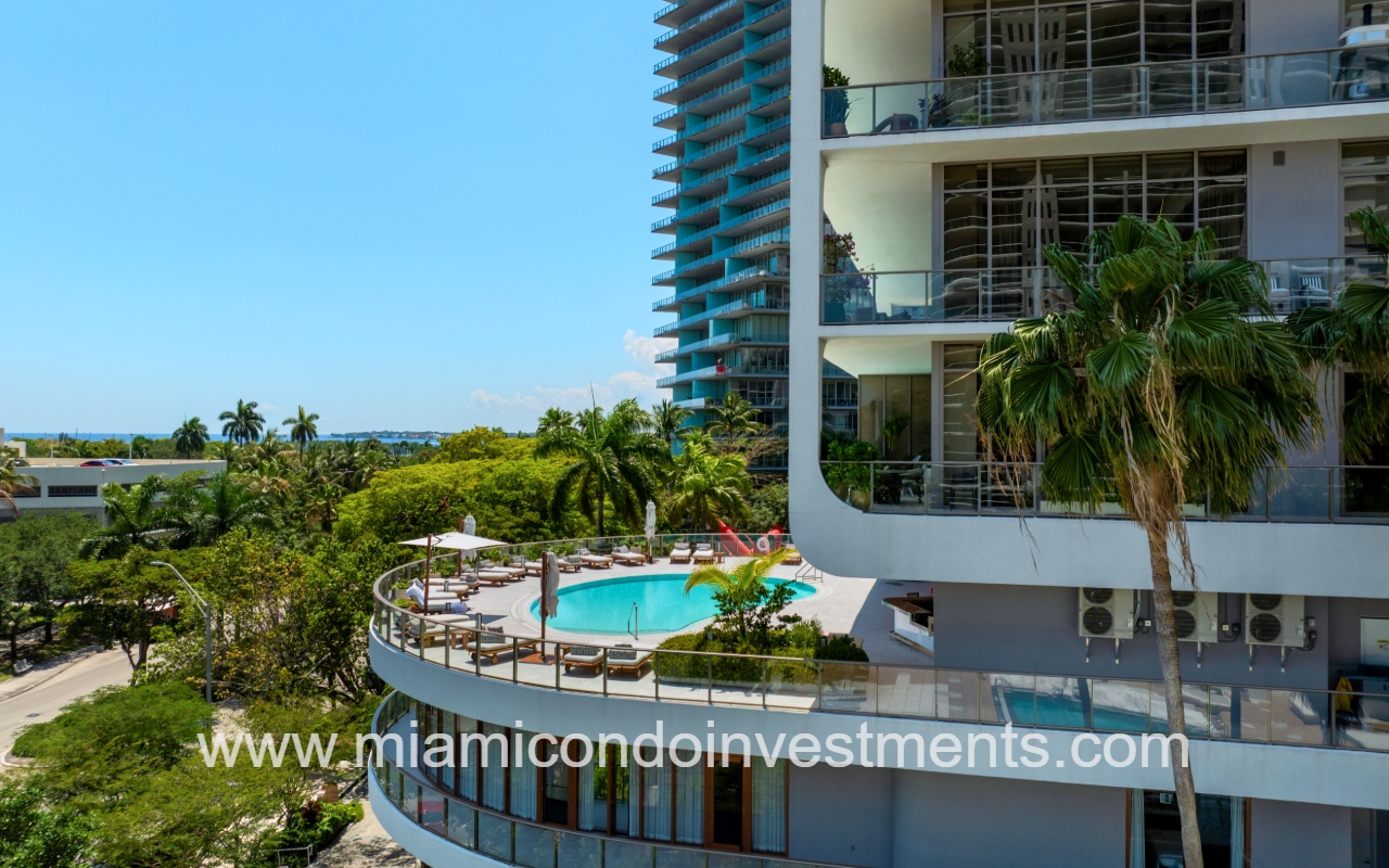 Mr. C Residences drone facing lower side of building and pool