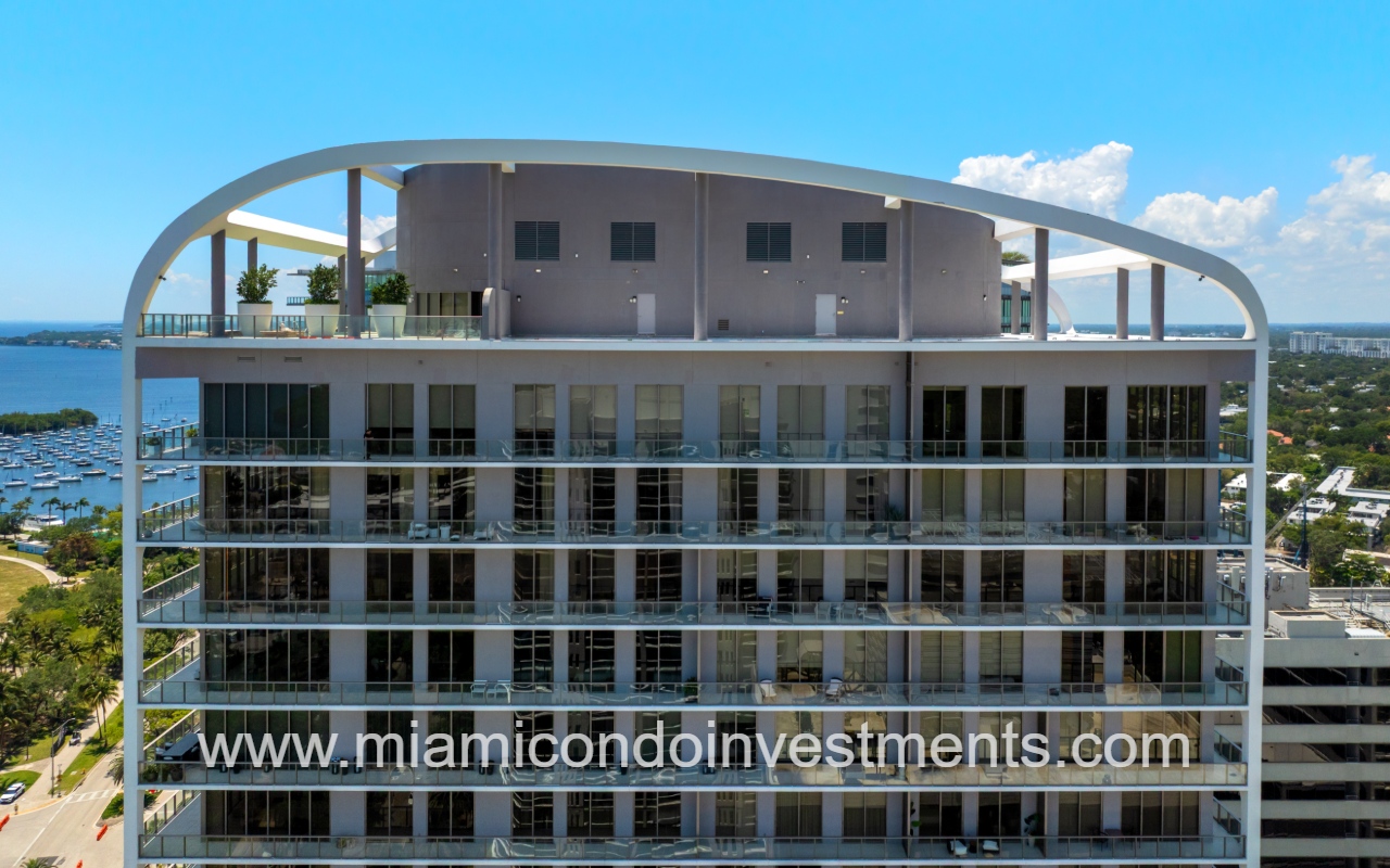 Mr. C Residences drone facing top part of building closeup
