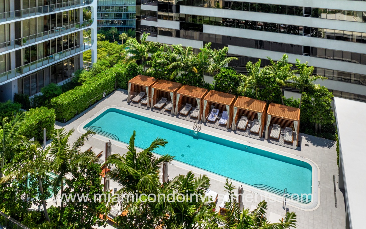 Mr. C Residences drone o f pool and cabanas