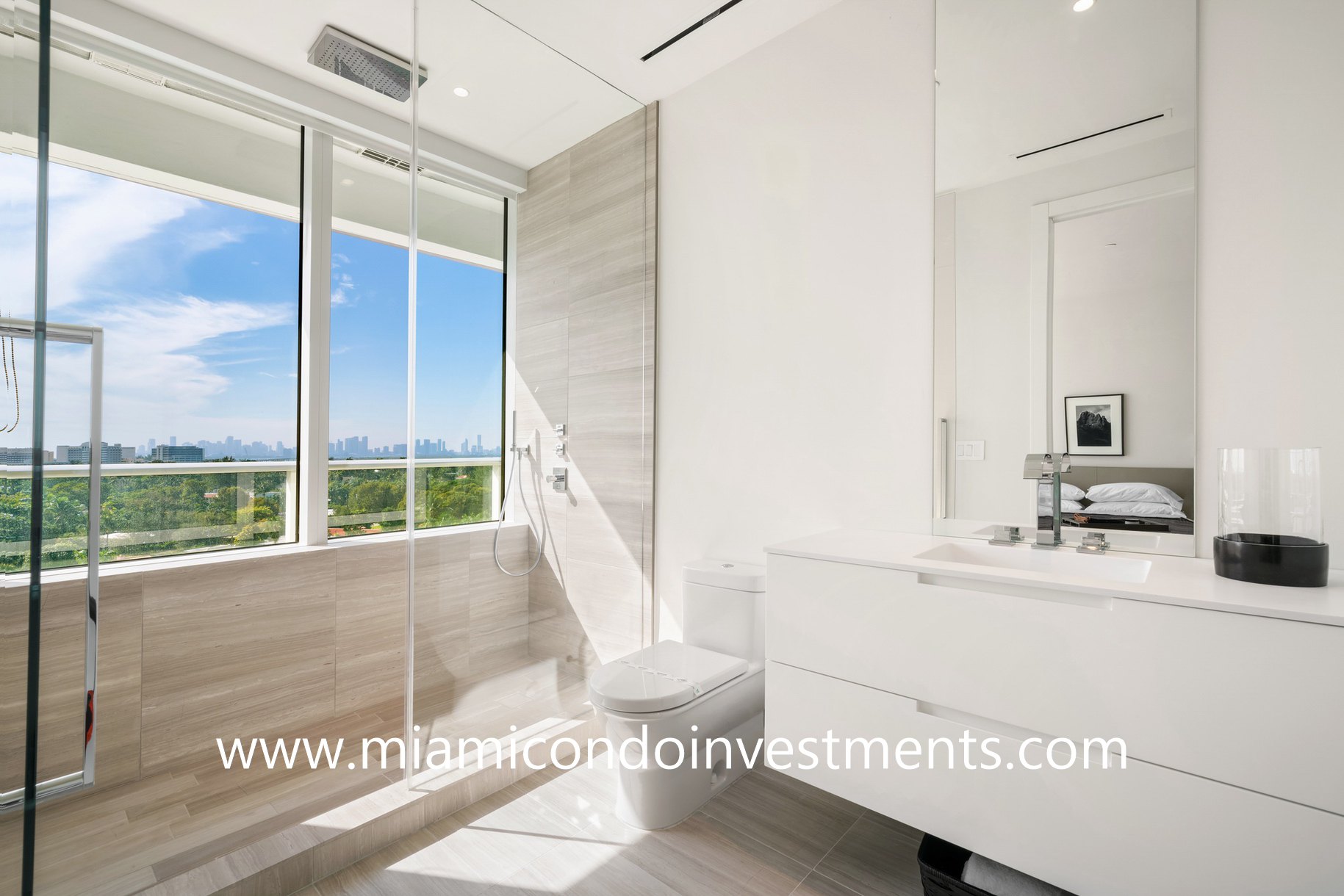 second bathroom with direct views of the downtown Miami skyline