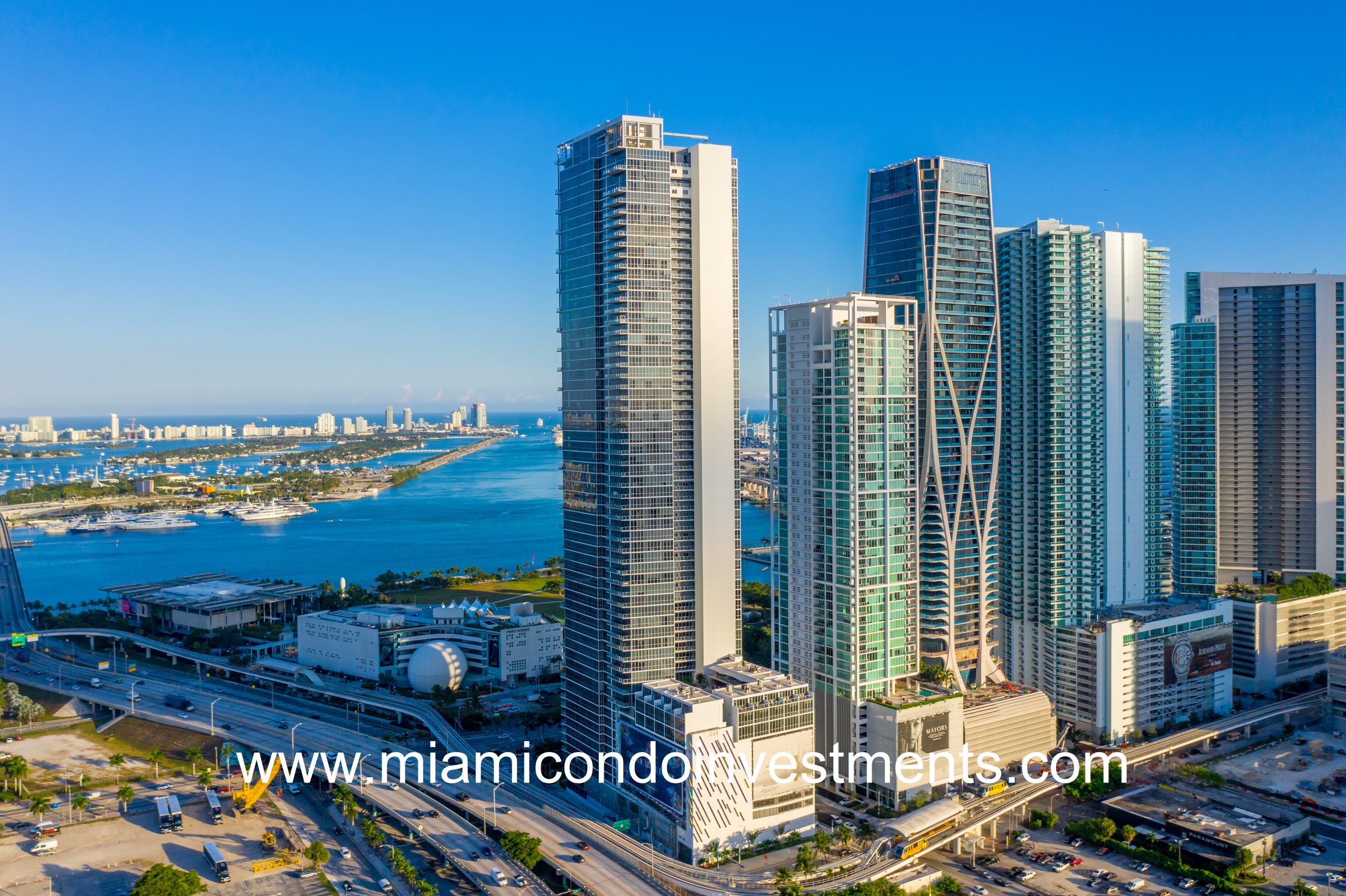 Marquis Residences Tower in Miami Beach with Miami Skyline